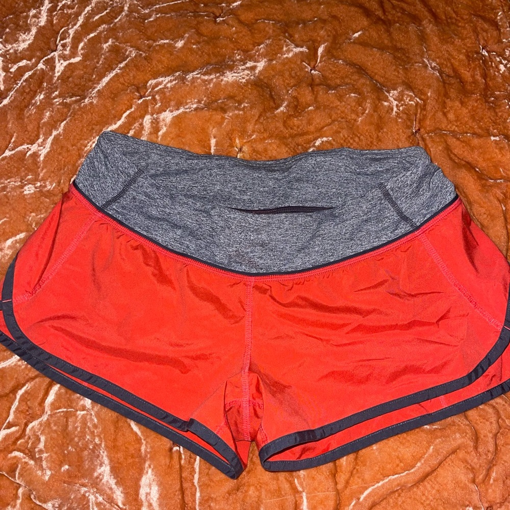 Size 6 Lululemon Athletica red and heather grey “speed up” shorts
